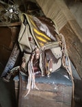 Post-apocalyptic, dirty, tattered leather khaki green and brown backpack, wasteland, larp, cosplay, metalhead
