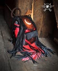 Fringed gothic backpack with moon motif